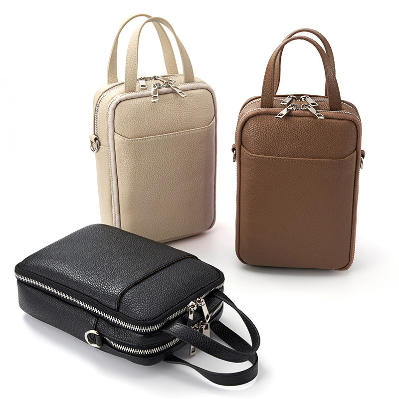 Ženska kožna crossbody torba, vertikalni kvadratni oblik, zatvarač, podstava od poliestera, unutarnji džepovi