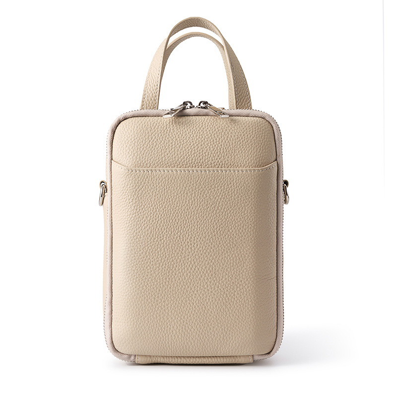 Ženska kožna crossbody torba, vertikalni kvadratni oblik, zatvarač, podstava od poliestera, unutarnji džepovi