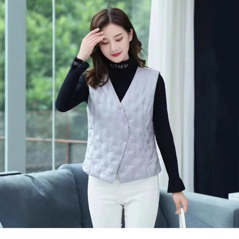 Дамски пухен жилет, тесен силует, V-образно деколте, Nylon плат, пух бял гъши 86–90%