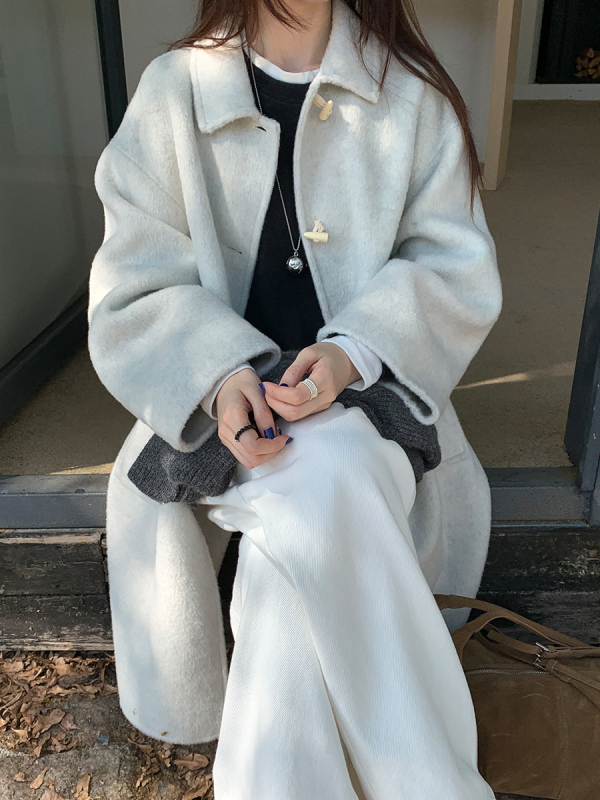 Női gyapjúkabát juhgyapjút tartalmazó, hosszú, gallérral, patentos és csatos záródás, koreai-japán stílus