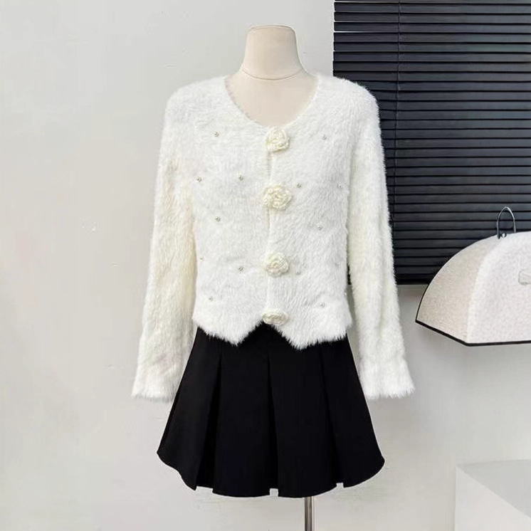 Kardigan od pletenog materijala s pahuljastim nercem izgledom, tiskani uzorak, debeli pleteni materijal, slobodan kroj, okrugli ovratnik, dugi rukavi