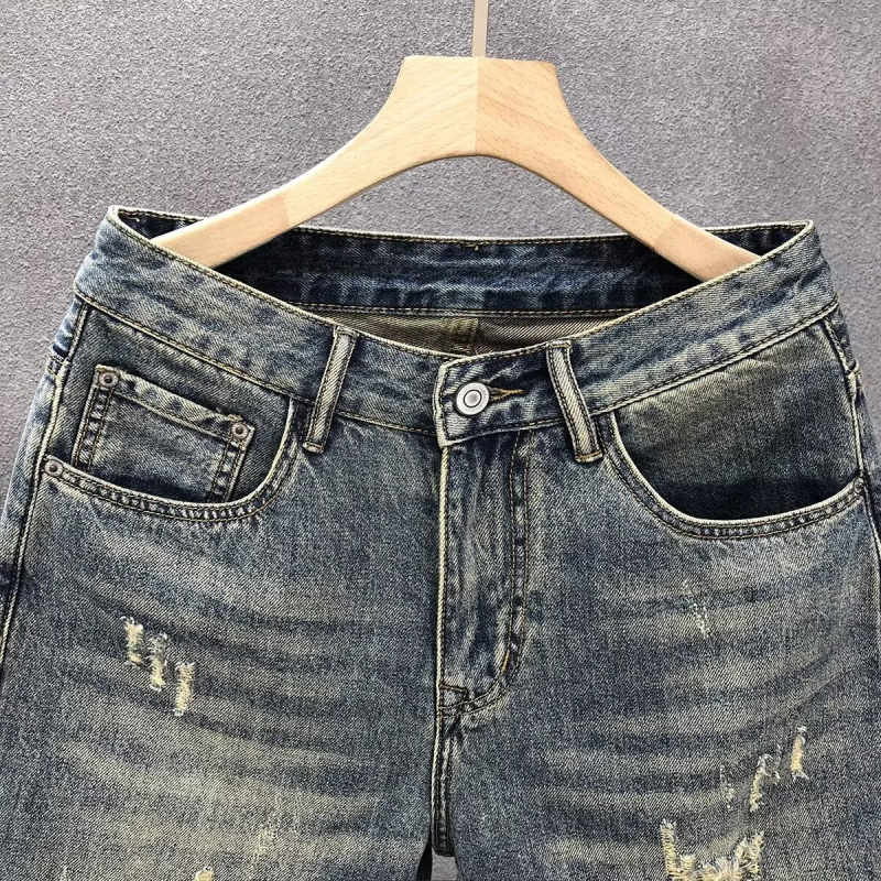 Muške traper šorceve, do koljena, širokog kroja, pamuk denim, retro s poderanim detaljima