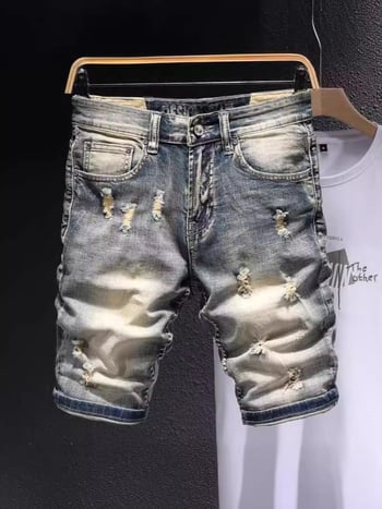 Muške traper šorke, rastezljivi denim od pamuka, s patch-ovima istrošenog izgleda, straight kroj, ljetni street style