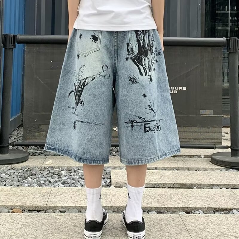 Unisex kapri traper šorc - labav kroj, ravne nogavice, srednji pojas, pamučni kaubojski denim, zakrpe dekor, ljeto 2025