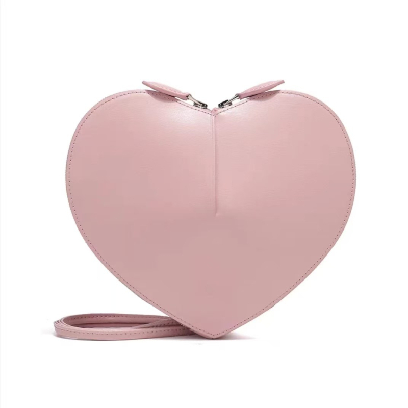 Ženska crossbody torba sa srcolikim oblikom, PU materijal, gradski minimalistički stil, zatvarač, jesen 2025
