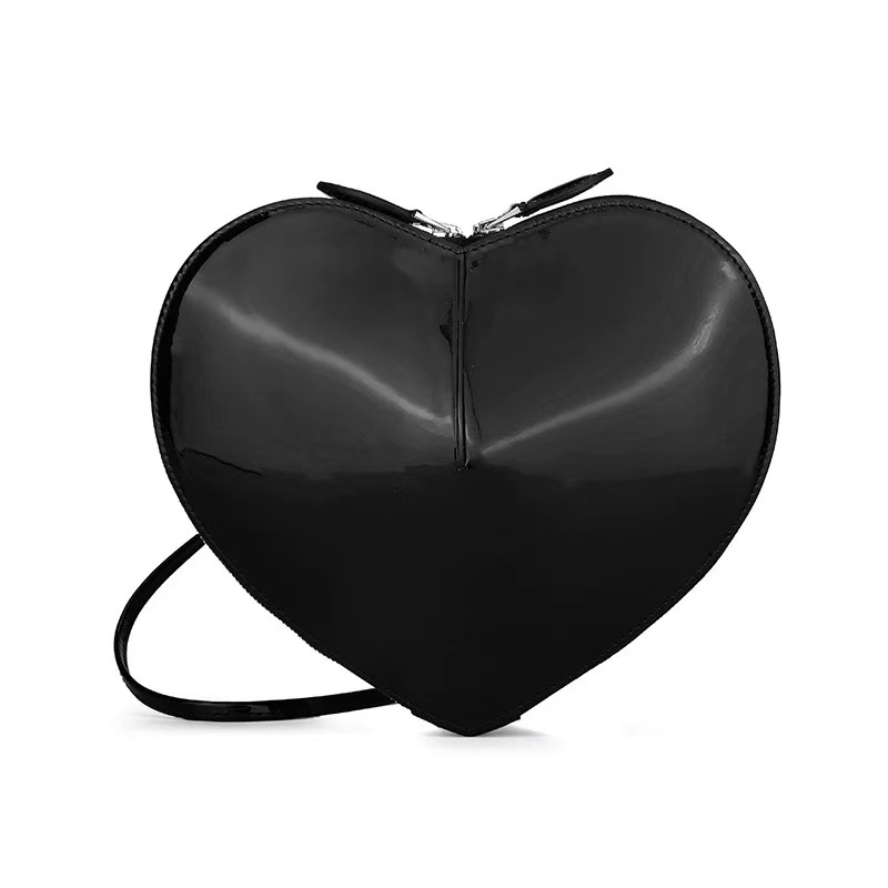 Ženska crossbody torba sa srcolikim oblikom, PU materijal, gradski minimalistički stil, zatvarač, jesen 2025