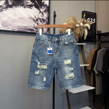 Denim šortsi s iskidanim detaljima, lagan kroj, srednji pojas, mješavina lana i poliestera (70% poliestera)