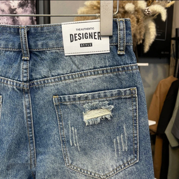 Denim šortsi s iskidanim detaljima, lagan kroj, srednji pojas, mješavina lana i poliestera (70% poliestera)