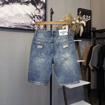 Denim šortsi s iskidanim detaljima, lagan kroj, srednji pojas, mješavina lana i poliestera (70% poliestera)