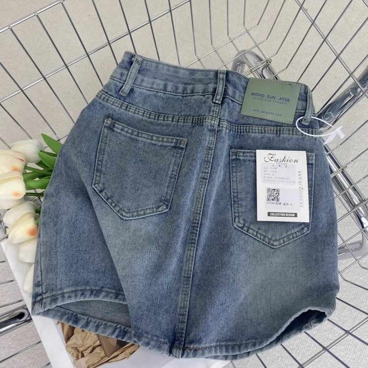 Denim suknja A-linije kratka, visokim strukom, distres detalji i kopče
