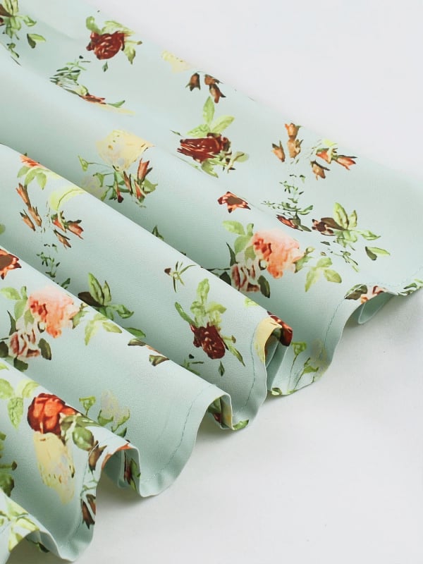 Флорална пола A-line с стягане на талията, копче отпред, полиестер с еластан, микроеластичност, ретро стил