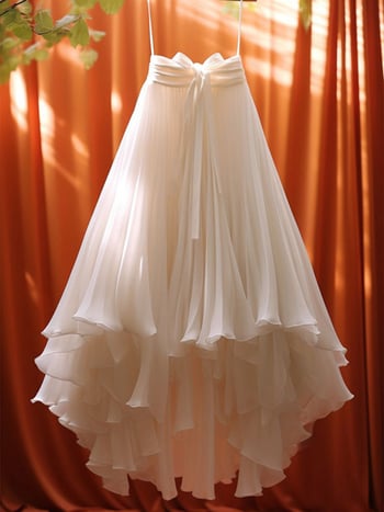 Плисирана дълга пола с многопластов дизайн и презрамки с пеперудено оформление, шифоново-полиестерова материя, 90-95% полиестер, пролет 2025