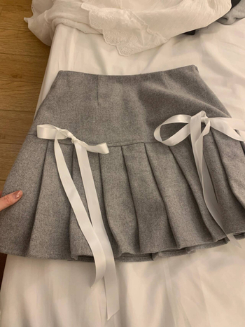 Baletno inspirirana plisirana suknja, kratka, visoki struk, poliester (95%+)