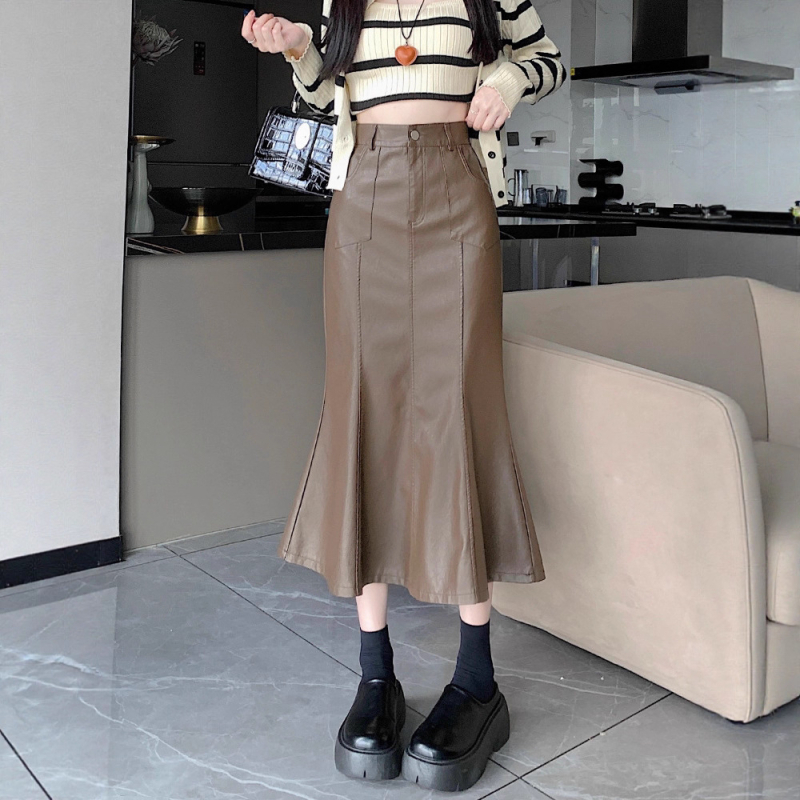 Duga PU kožna suknja s repom ribe, visokim strukom, rub s listom lotosa, jesen 2025