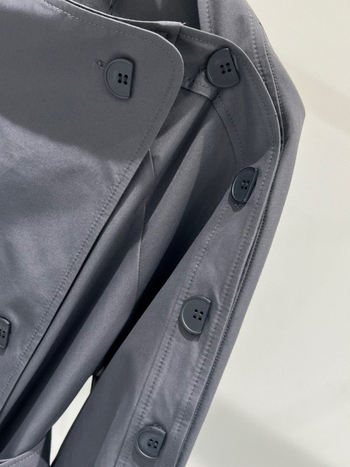 Дамско палто до средна дължина с двуредно закопчаване, кръгла яка, едноцветен модел, свободен силует