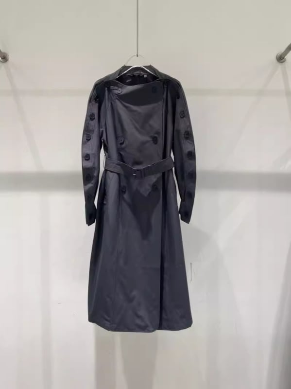 Дамско палто до средна дължина с двуредно закопчаване, кръгла яка, едноцветен модел, свободен силует