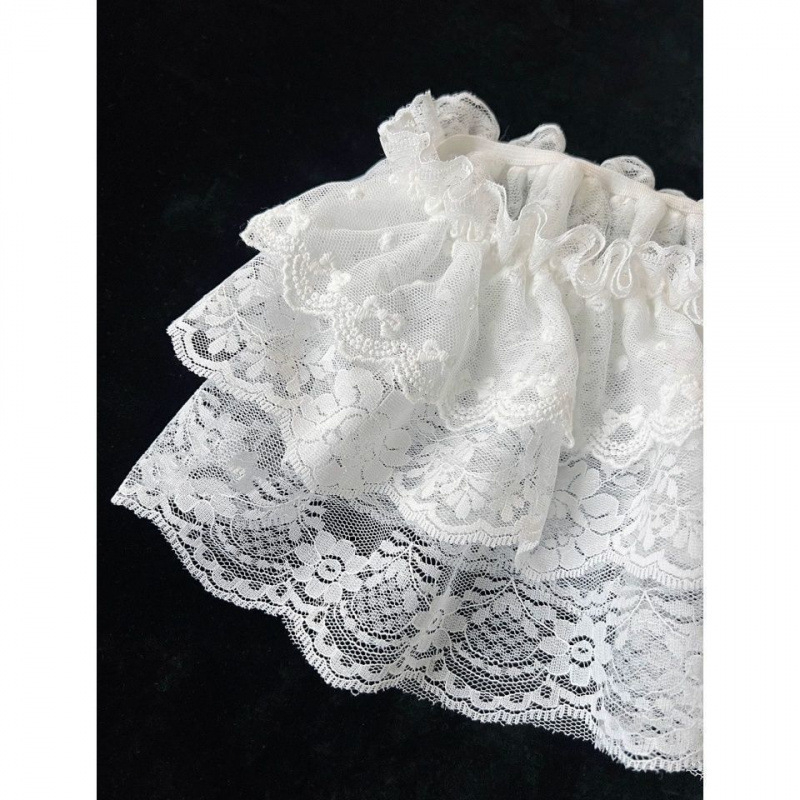 Детска мини пола с мрежеста полиестерна тъкан, нерегулярна кройка, съдържание на основна материя 71–80%, подходяща за деца над 8 години