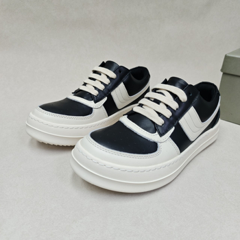 Unisex niske skate tenisice s okruglim prstom, gornji dio od top grain kože, potplat od gume, zatvaranje vezivanjem šnura, visina peta 3–5 cm