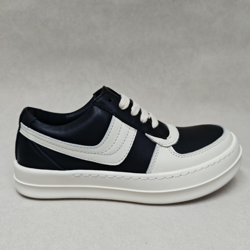 Unisex niske skate tenisice s okruglim prstom, gornji dio od top grain kože, potplat od gume, zatvaranje vezivanjem šnura, visina peta 3–5 cm