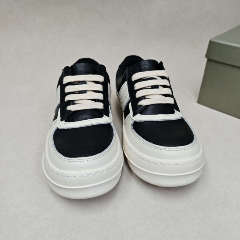 Unisex niske skate tenisice s okruglim prstom, gornji dio od top grain kože, potplat od gume, zatvaranje vezivanjem šnura, visina peta 3–5 cm