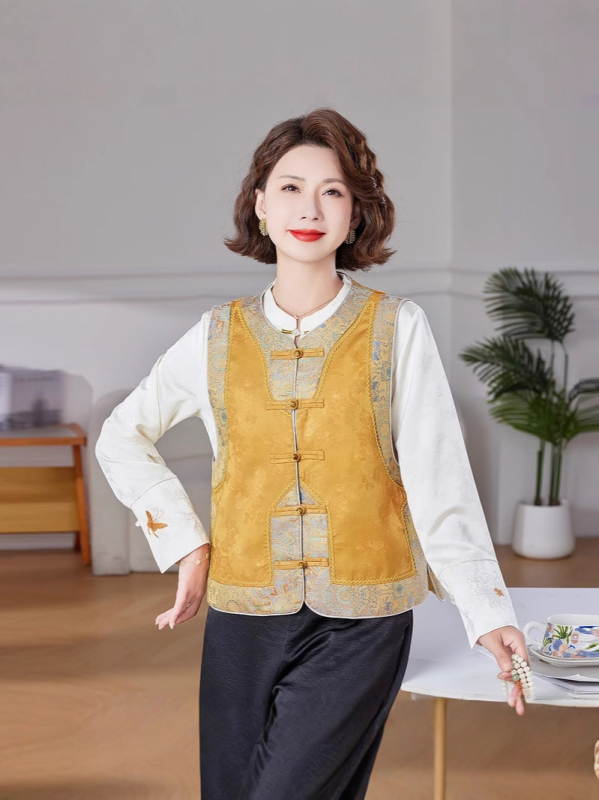Жилет в китайски стил с кръгла яка, ретро дух; полиестерен плат, съдържание 80–90%, закопчаване на един ред копчета.