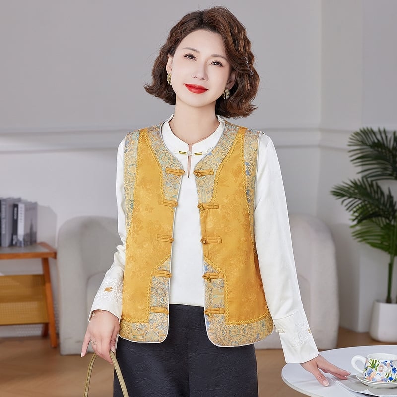 Жилет в китайски стил с кръгла яка, ретро дух; полиестерен плат, съдържание 80–90%, закопчаване на един ред копчета.