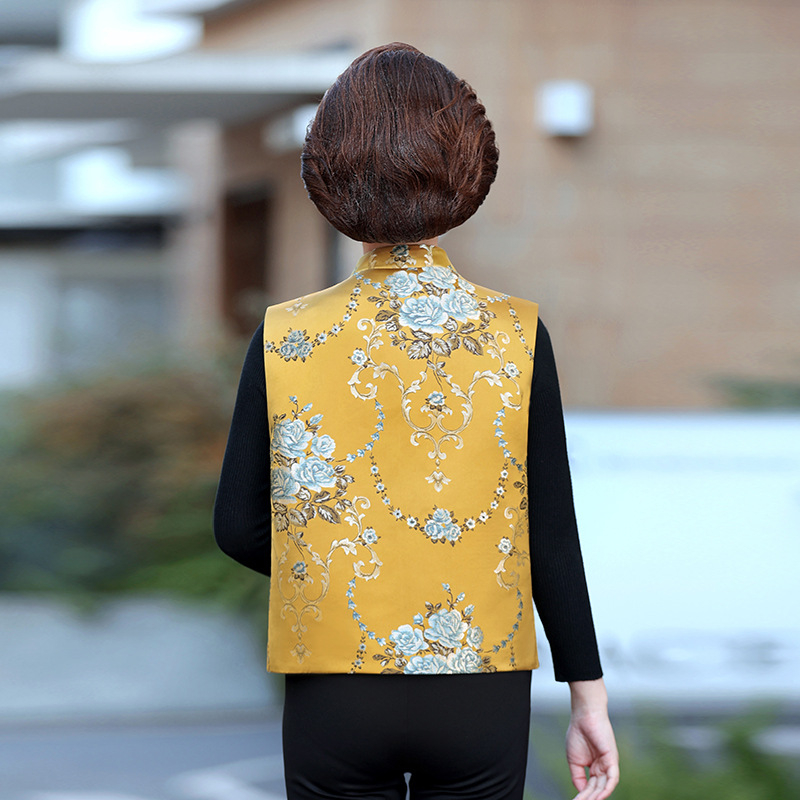 Дамска жилетка в китайски стил с V-образно деколте, закопчаване с катарами по планката, принт растения и цветя, материя полиестер (≥95%), свободна кройка, дължина 50–65 cm