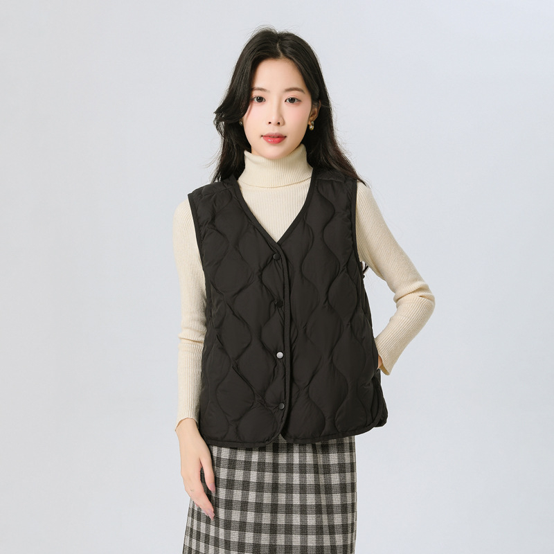 Γυναικείο γιλέκο από πούπουλο, λεπτό, V-λαιμό, μοτίβο κολοκύθας, γέμισμα από λευκό πούπουλο 86–90%, κοντό μήκος, εξωτερικό ύφασμα πολυεστέρα 95%+