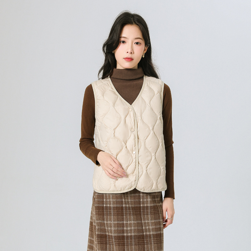 Γυναικείο γιλέκο από πούπουλο, λεπτό, V-λαιμό, μοτίβο κολοκύθας, γέμισμα από λευκό πούπουλο 86–90%, κοντό μήκος, εξωτερικό ύφασμα πολυεστέρα 95%+