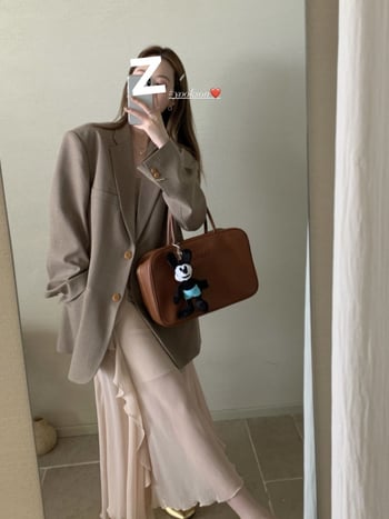 Дамски малък костюм с поло яка, дълги ръкави, полиестер 50–70% в тъканта, еднобортно закопчаване