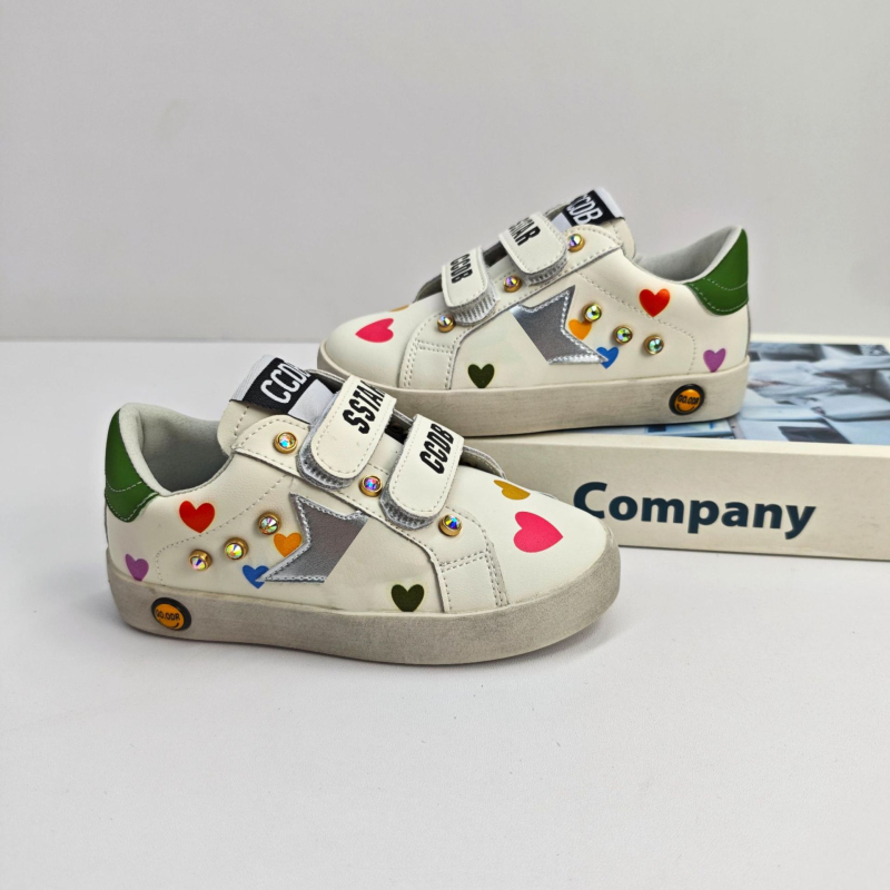 Teniske s tankim potplatom, gornji dio od prave kože, kopčanje na Velcro, uzorak zvjezdice, gumasta potplata, korejski stil