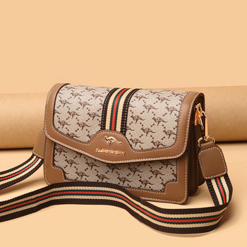 Ženska crossbody torba – mekana sintetička koža, mali kvadratični oblik, zatvaranje poklopcem, unutarnji džepovi sa zipom i džep za dokumente, dvostruke naramenice