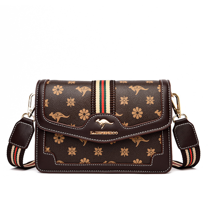 Ženska crossbody torba – mekana sintetička koža, mali kvadratični oblik, zatvaranje poklopcem, unutarnji džepovi sa zipom i džep za dokumente, dvostruke naramenice