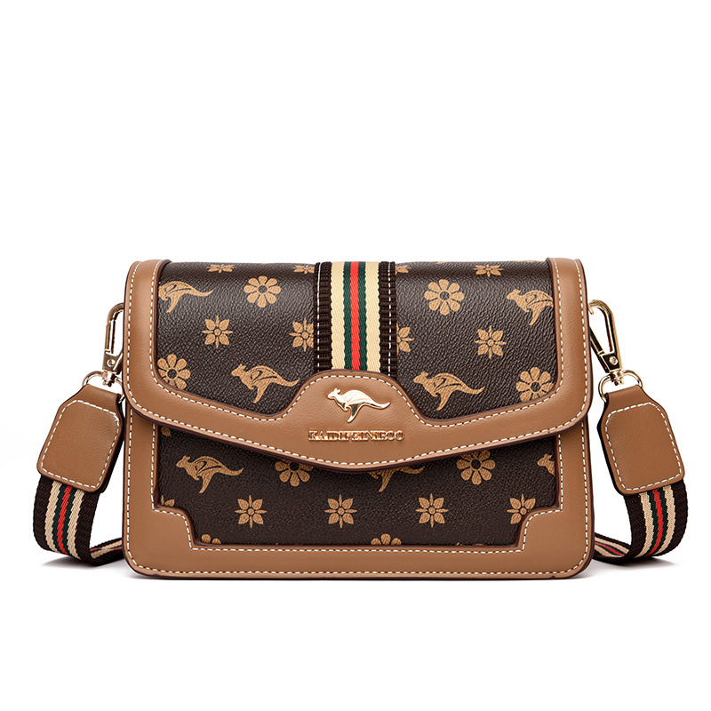 Ženska crossbody torba – mekana sintetička koža, mali kvadratični oblik, zatvaranje poklopcem, unutarnji džepovi sa zipom i džep za dokumente, dvostruke naramenice