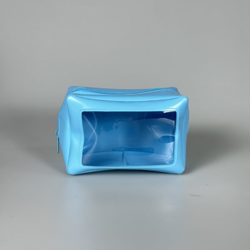 PVC vízálló sminktáska belső rácsos rekeszekkel, kerek forma, levehető fogantyú