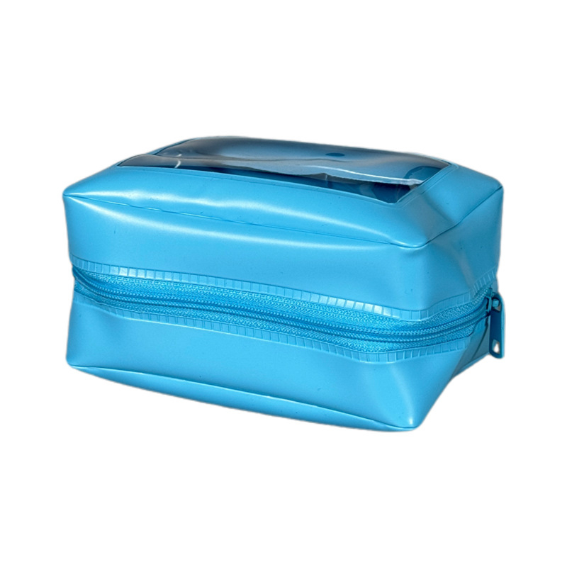 PVC vízálló sminktáska belső rácsos rekeszekkel, kerek forma, levehető fogantyú