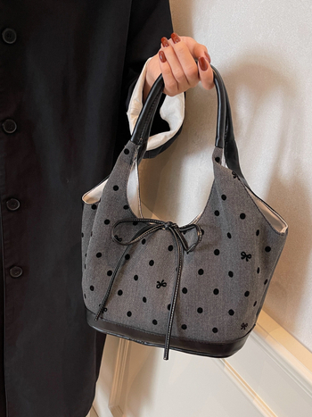 Kanvas bucket torba s urbanim minimalističkim dizajnom, magnetsko zatvaranje, dvostruke naramenice