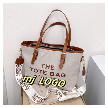 Ženska torbica za rame od platna, urban minimalist stil, zatvaranje zip zatvaračem, vodoravni kvadratnog oblika, unutarnji džepovi: skriveni džep sa zatvaračem, džep za telefon, džep za ID, džep za kameru