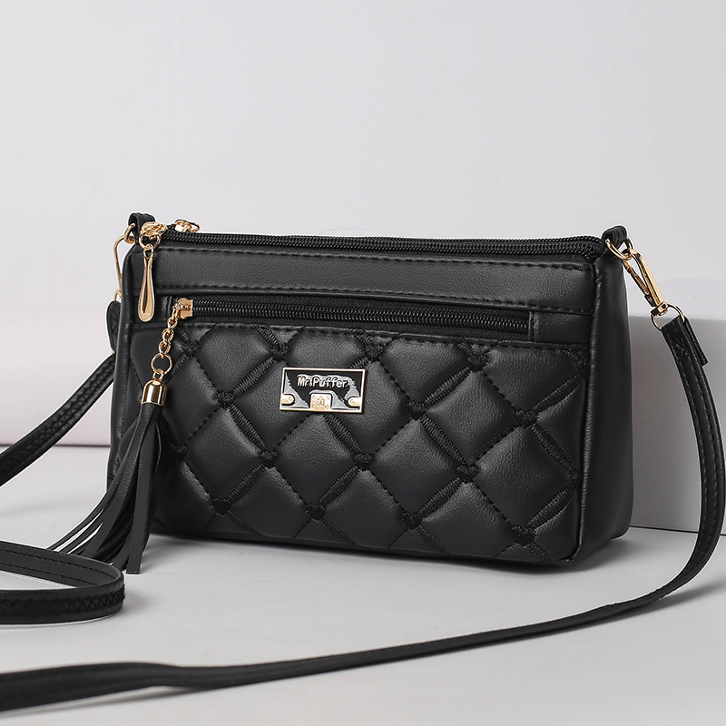 Női PVC keresztpántos táska | cipzáras zárás, belső zsebek telefonhoz, ID-hoz és cipzáras rekesz, poliészter bélés, horizontális négyzet alakú