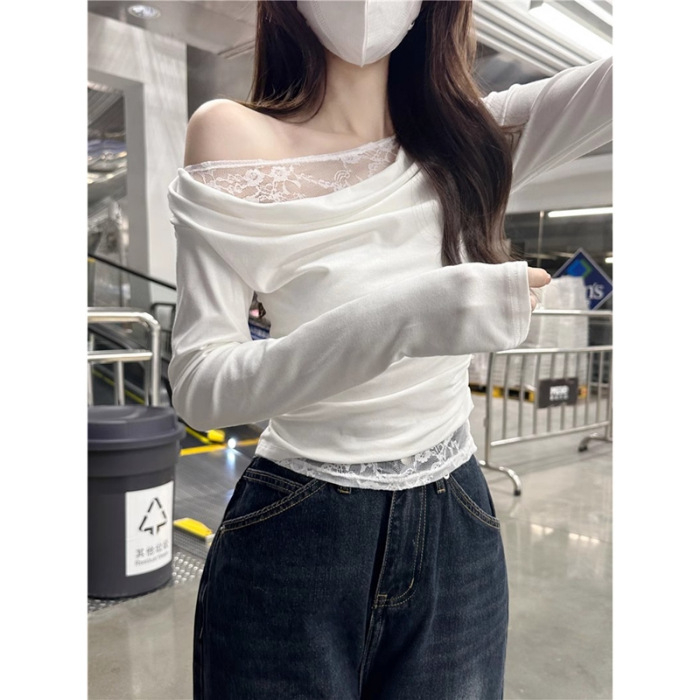 Viszkóz anyagú felső csipkés varrással, vállról nyitott, hosszú ujjú, karcsú szabás, rövid