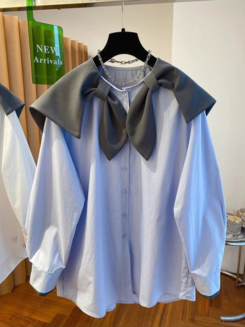 Bluza s polo ovratnikom, silueta u stilu kardigana, dugi rukavi, uski kroj, sadržaj pamuka 95%+.