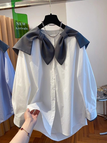 Bluza s polo ovratnikom, silueta u stilu kardigana, dugi rukavi, uski kroj, sadržaj pamuka 95%+.