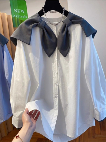 Bluza s polo ovratnikom, silueta u stilu kardigana, dugi rukavi, uski kroj, sadržaj pamuka 95%+.