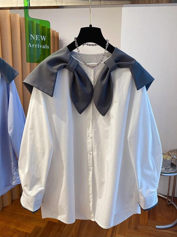 Bluza s polo ovratnikom, silueta u stilu kardigana, dugi rukavi, uski kroj, sadržaj pamuka 95%+.