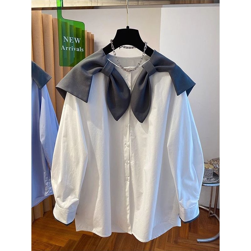 Bluza s polo ovratnikom, silueta u stilu kardigana, dugi rukavi, uski kroj, sadržaj pamuka 95%+.