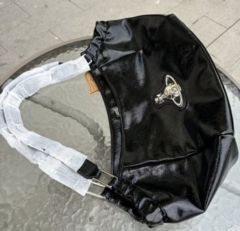 Torba bucket s uzorkom liči, PU koža, okrugli oblik, otvoreni vrh, proljeće 2025