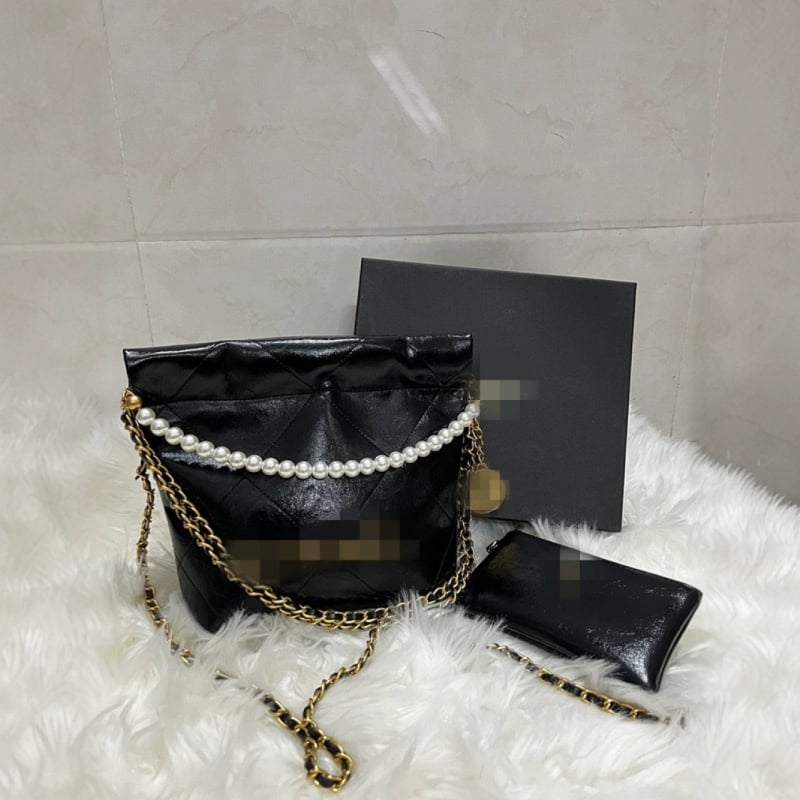 Crossbody torbica bucket od PU, horizontalni kvadratni oblik, magnetsko zatvaranje, jedan remen