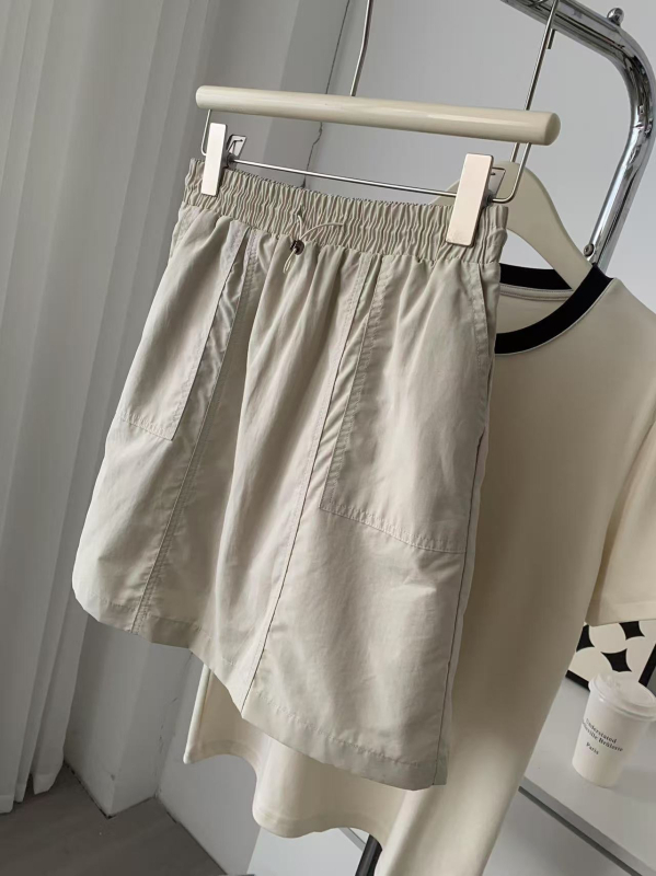 A-linijska suknja s visokim strukom, korejskog stila retro dojam, pamuk-nylon smjesa (50-70% pamuk, 30-50% nylon), ljeto 2025