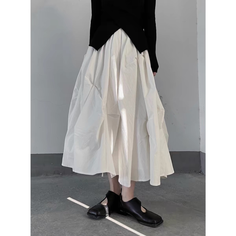 Nepravilna midi suknja s plisiranom teksturom, japansko-korejski casual stil, proljeće 2024