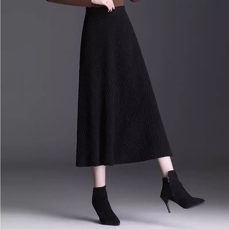 A-образна плетена пола до миди дължина, висока талия с ластик, плат смес найлон и полиестер (50-70% найлон, под 30% полиестер), микроеластична, елегантен стил за ежедневие